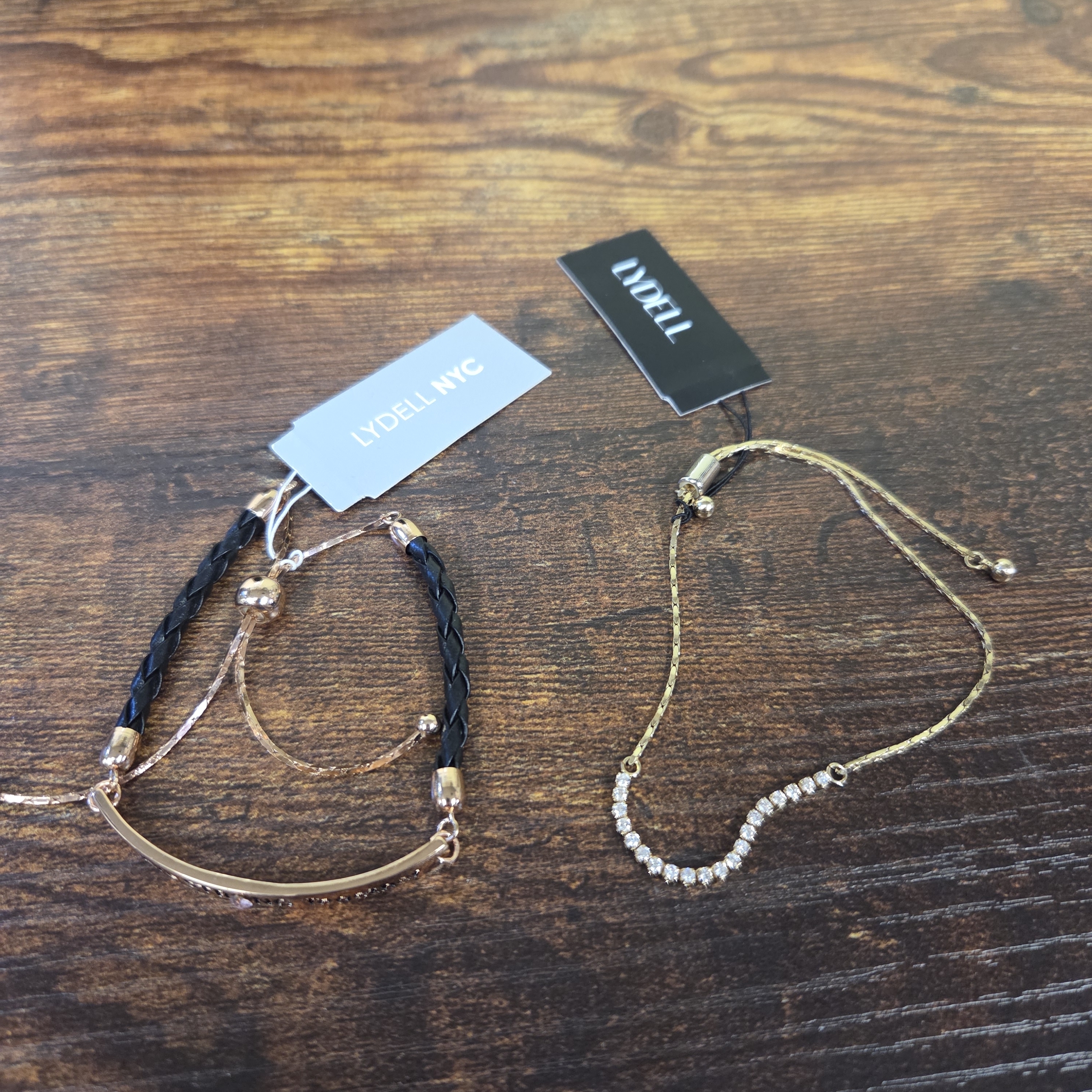 Bogolydell Nyc Goldtone And Black Adjustable Bracelet Duo 10$